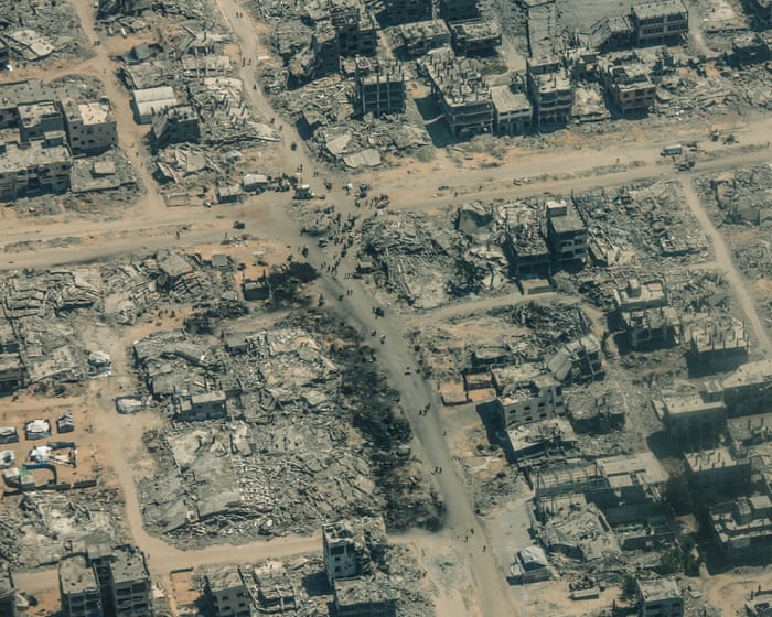 A barren landscape of rubble, dust, and graves—this is Gaza seen from above.