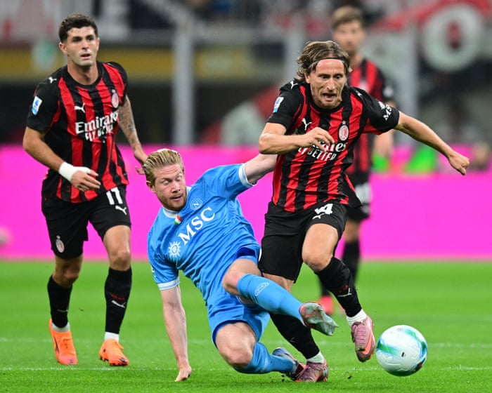 Modric grins while De Bruyne fumes as a reshaped Milan side withstands Napoli's pressure.