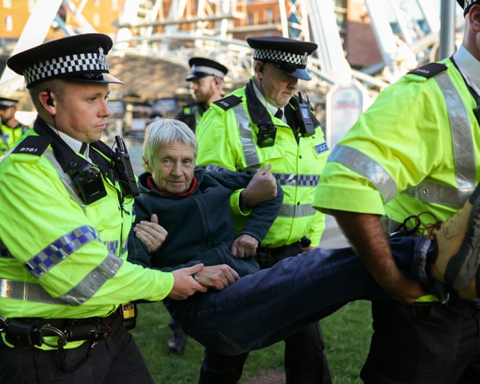 Police arrest dozens of Palestine Action protesters outside Labour party conference.