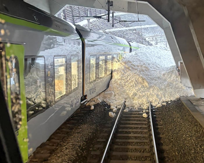 A train derailed in Switzerland as deadly avalanches swept through the Alps.