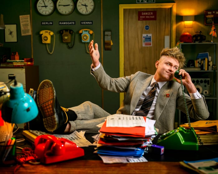 The UK's new Eurovision entry is here, and it's a quirky one—it even rhymes "pepperoni" with "feeling okey-dokey."