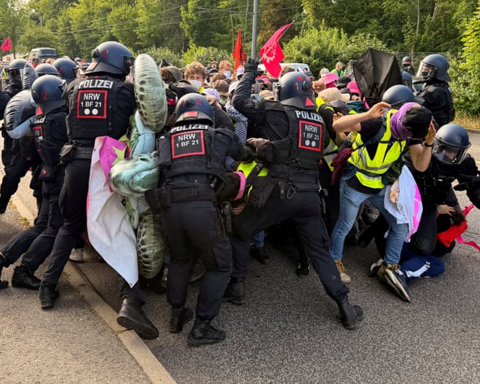 German riot police clashed with protesters who were trying to block a conference held by the far-right AfD party.