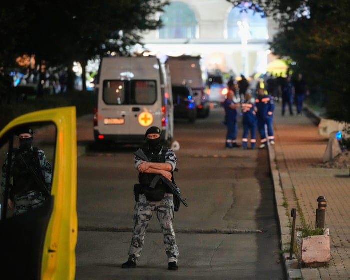 A bomb exploded in Moscow, killing at least three people, after a device carried by a woman went off.