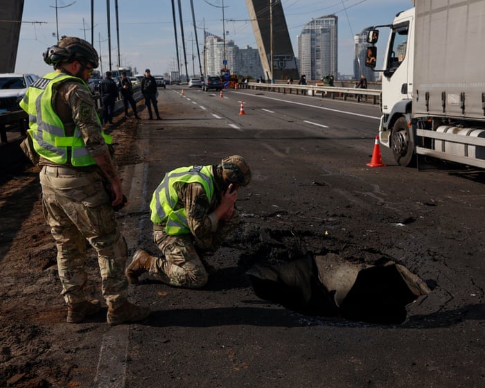 Russia hits Kyiv bridge during German chancellor's visit to Ukraine, showing support.
