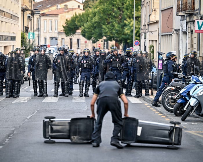 A 15-year-old schoolboy lost his hand after picking up a police stun grenade during school protests in France.